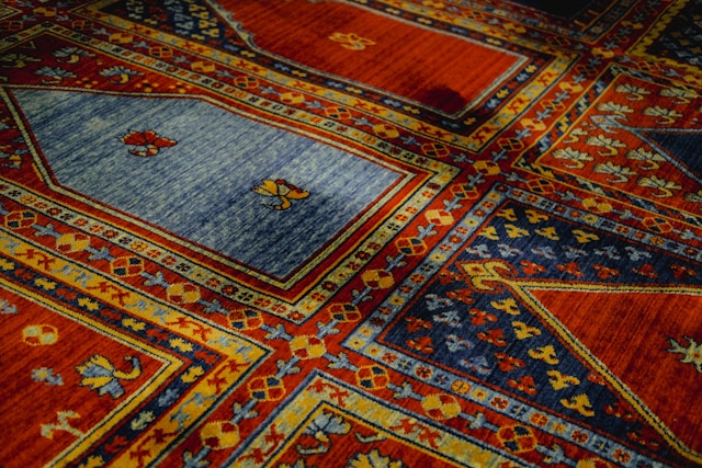 a-close-up-of-a-colorful-rug-with-many-different-colors